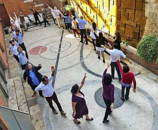 Chile group doing paneurythymy in courtyard